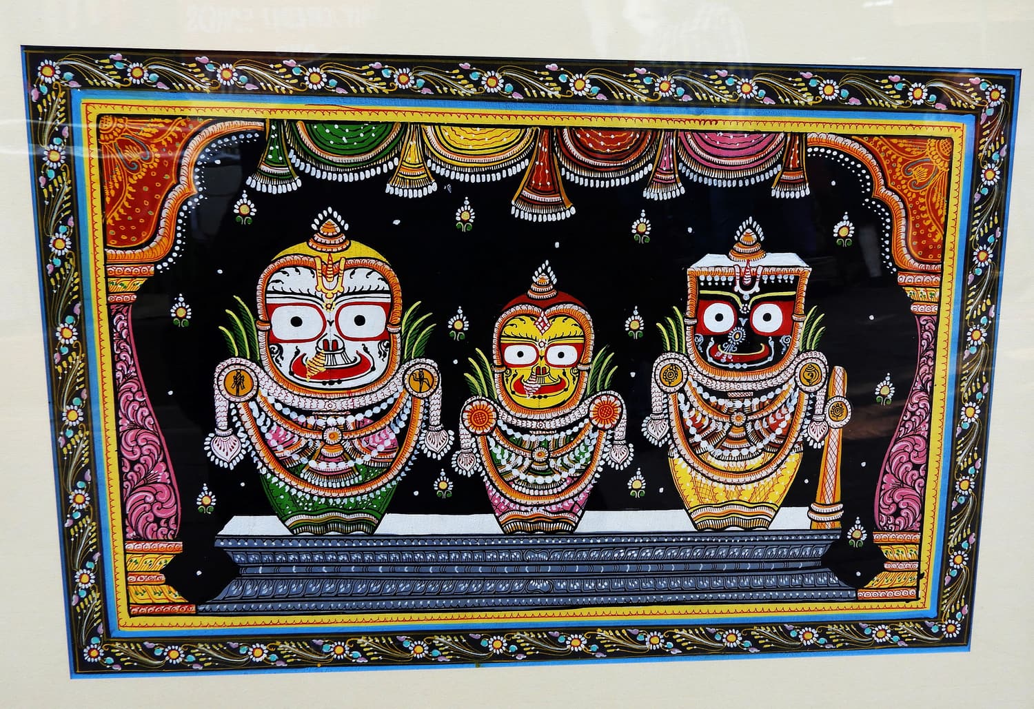 A pattachitra painting of Jagannath, Balabhadra and Subhadra